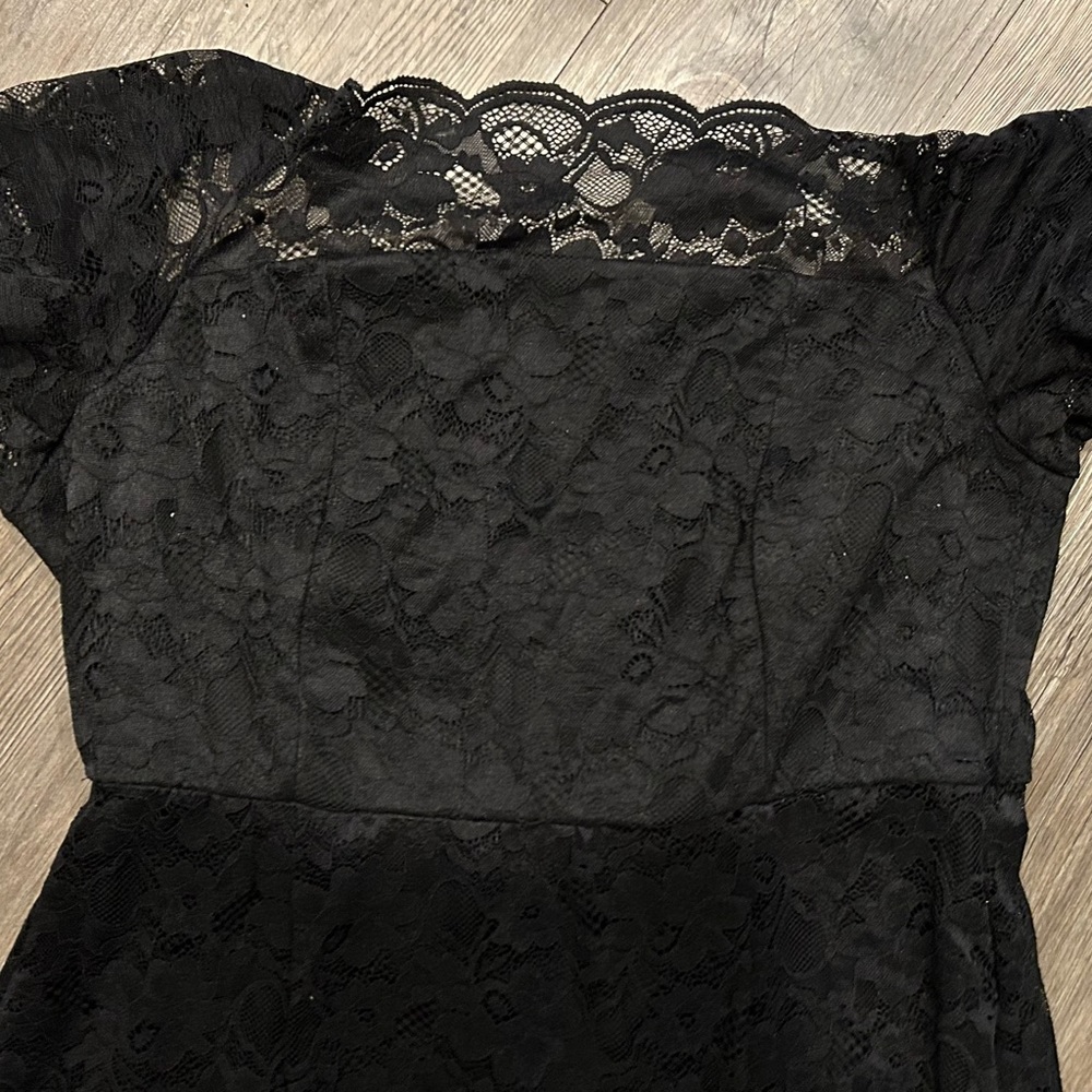 Torrid Black lace dress. Lace stretches to shoulders. Has been altered in back.